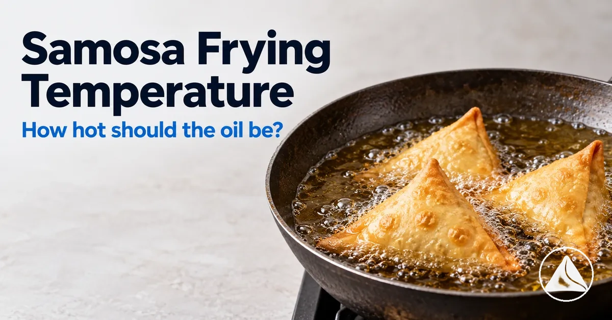 Samosas frying in oil at a controlled cooking temperature